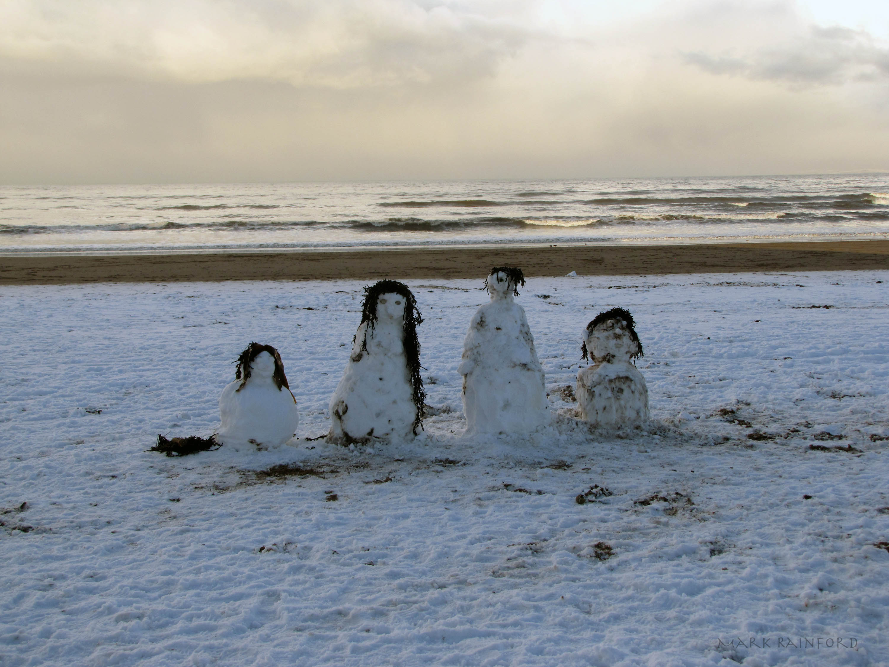 Snow Men on the Beach